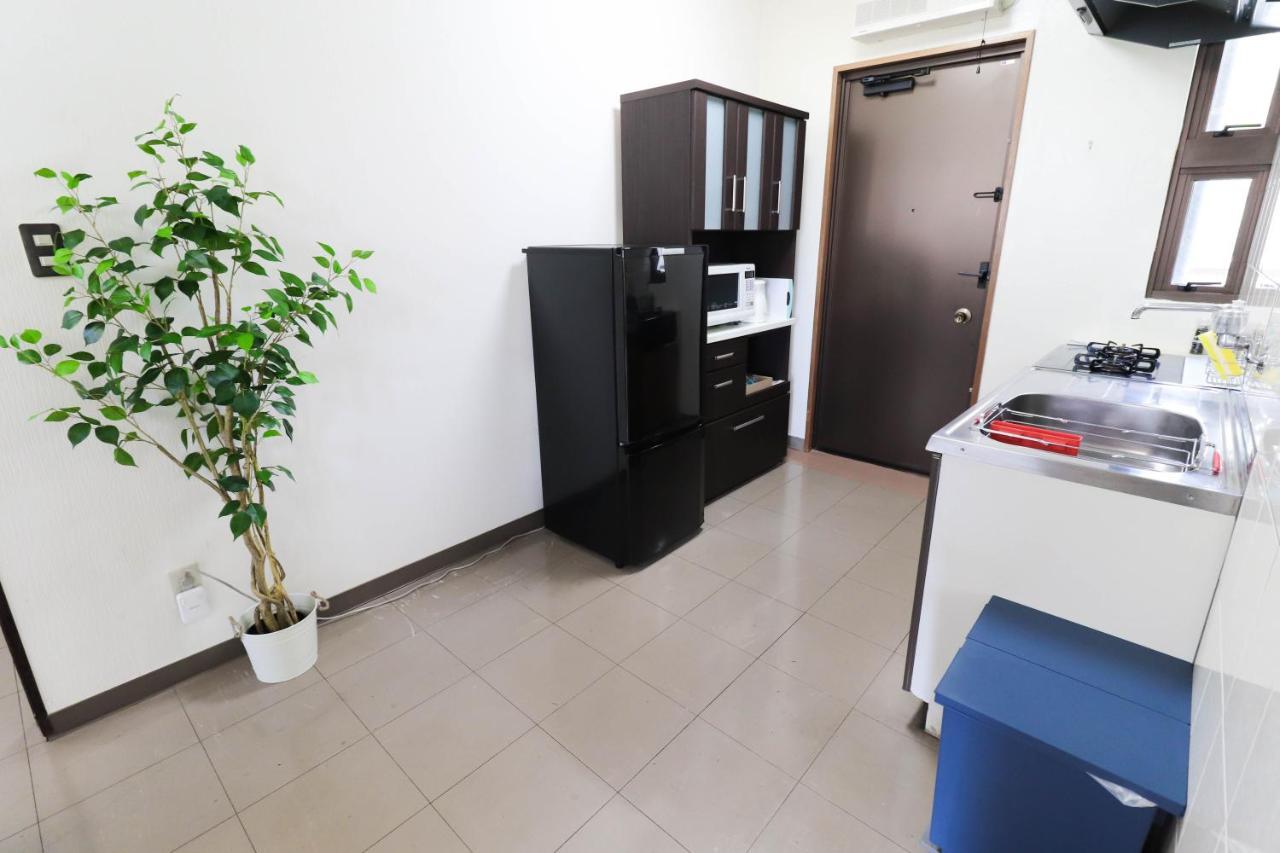 Condominium Hotel Mihama Upi Chatan Habitación foto