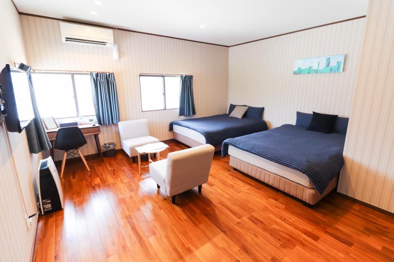 Condominium Hotel Mihama Upi Chatan Habitación foto