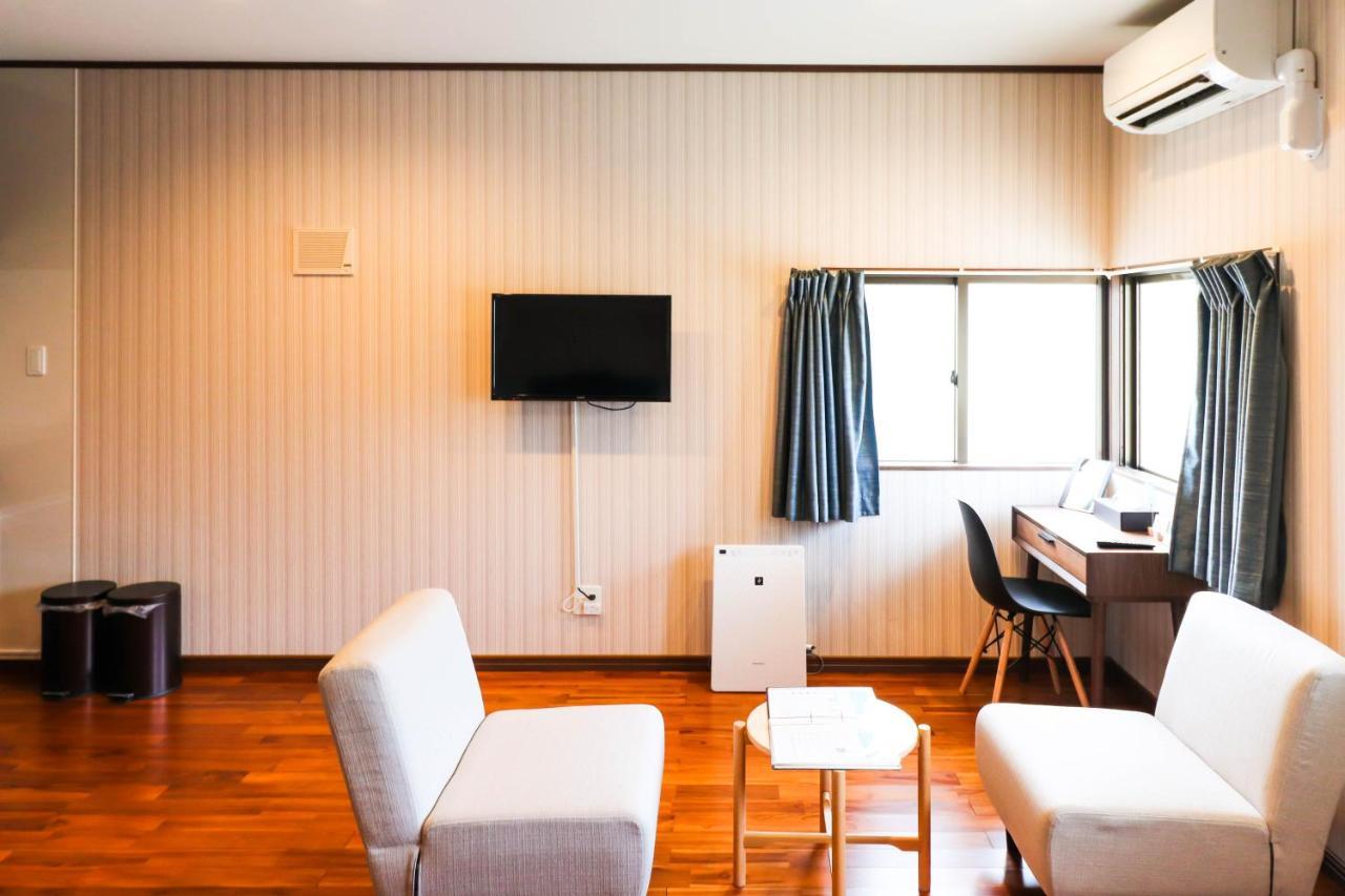 Condominium Hotel Mihama Upi Chatan Habitación foto