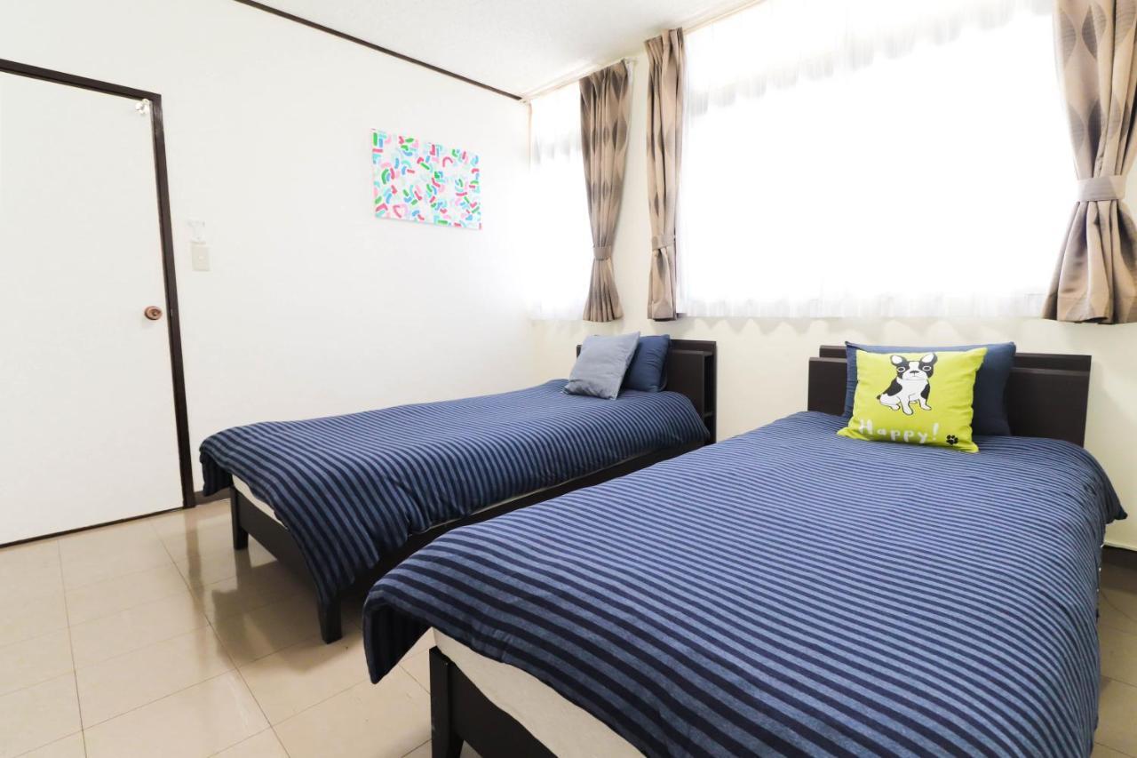 Condominium Hotel Mihama Upi Chatan Exterior foto