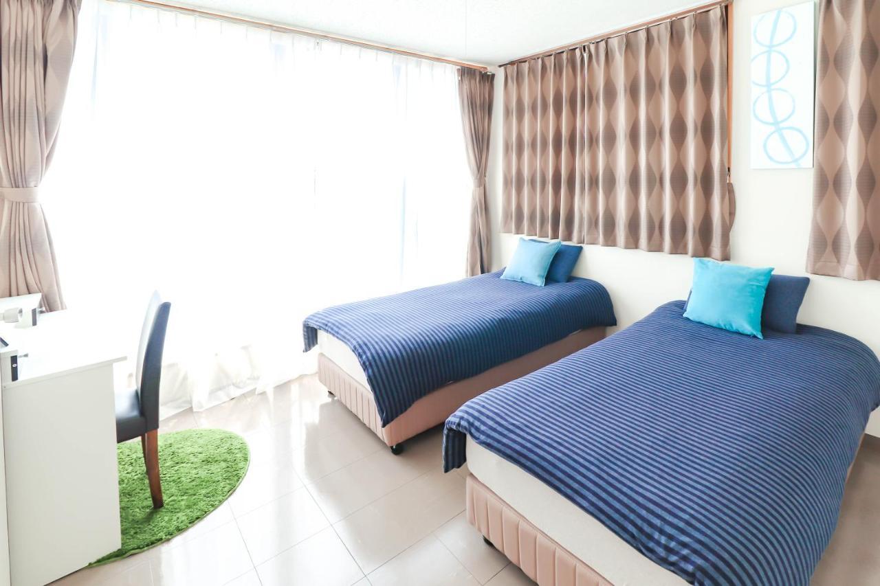 Condominium Hotel Mihama Upi Chatan Exterior foto